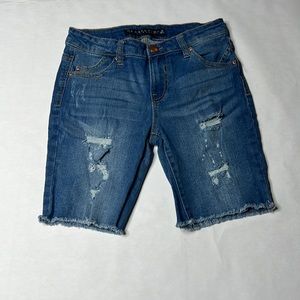 Mid thigh blue jean shorts